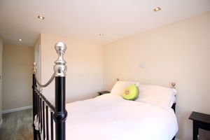 Bedroom One- click for photo gallery